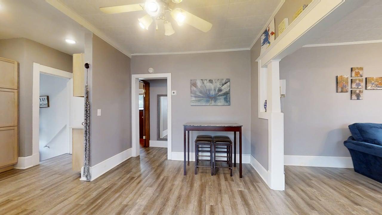 1311 West Hill Street Champaign, IL 61821 - Photo 7 of 25 a view of livingroom with furniture and wooden floor