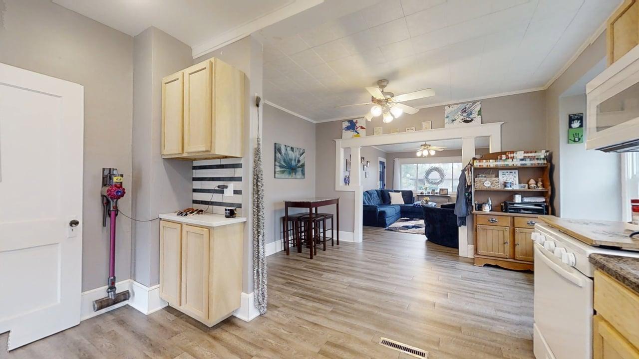 1311 West Hill Street Champaign, IL 61821 - Photo 10 of 25 a living room with furniture appliances and wooden floor