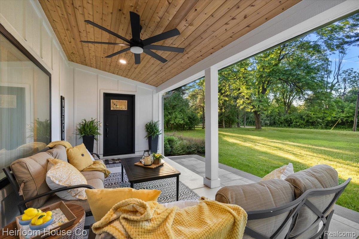 49001 Hanford Road Canton, MI 48187 - Photo 4 of 98 Covered porch with wood-finish ceiling and a large ceiling fan