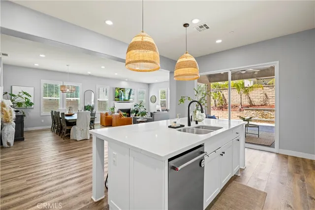 a bathroom with a sink double vanity and a mirror