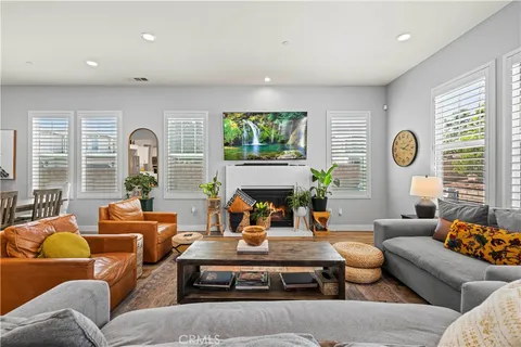 a living room with furniture and a table