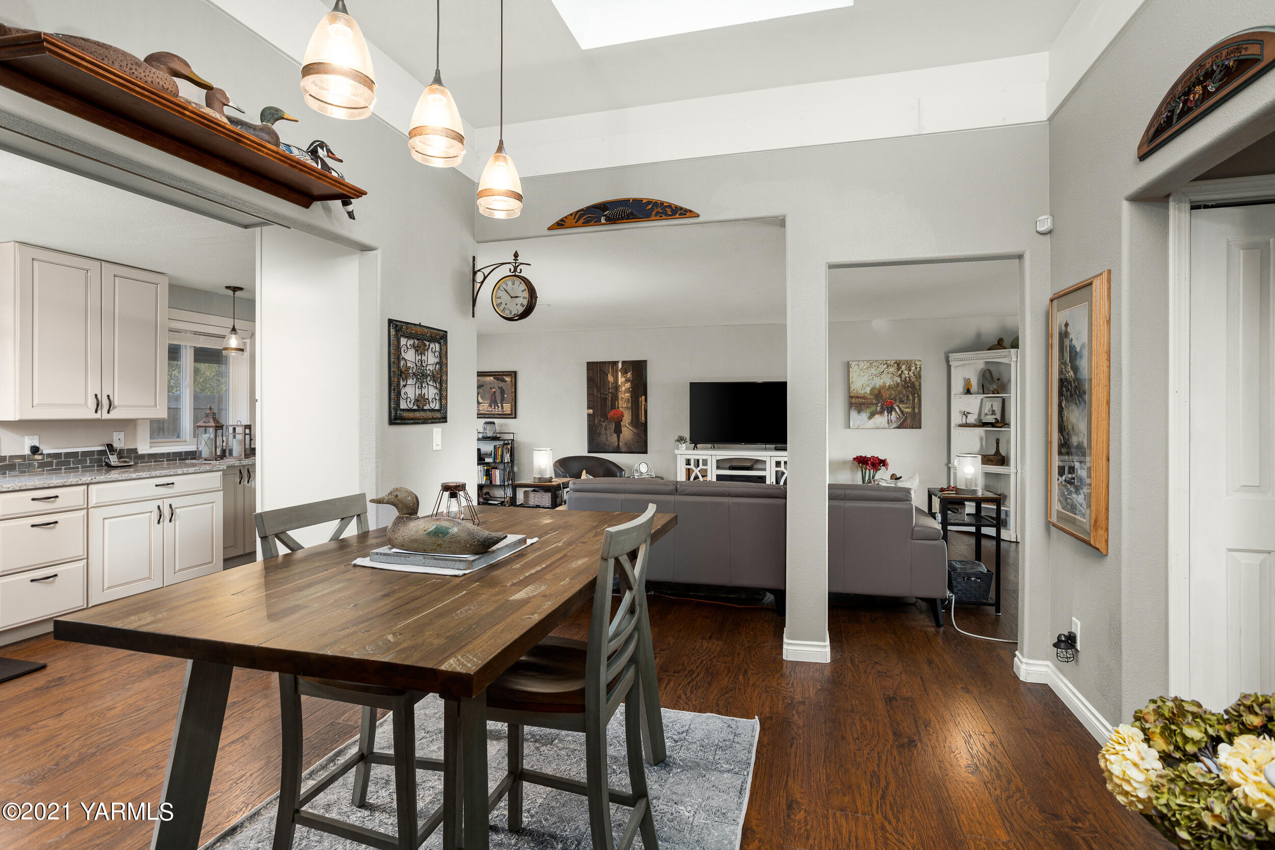 1517 South 32nd Avenue Yakima, WA 98902 - Photo 11 of 21 a view of a dining room with furniture and wooden floor