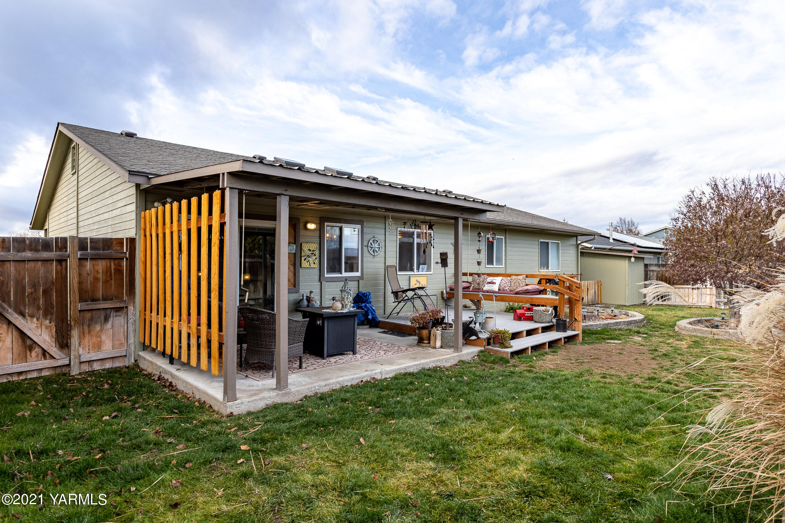 1517 South 32nd Avenue Yakima, WA 98902 - Photo 19 of 21 a view of a house with a patio and a yard
