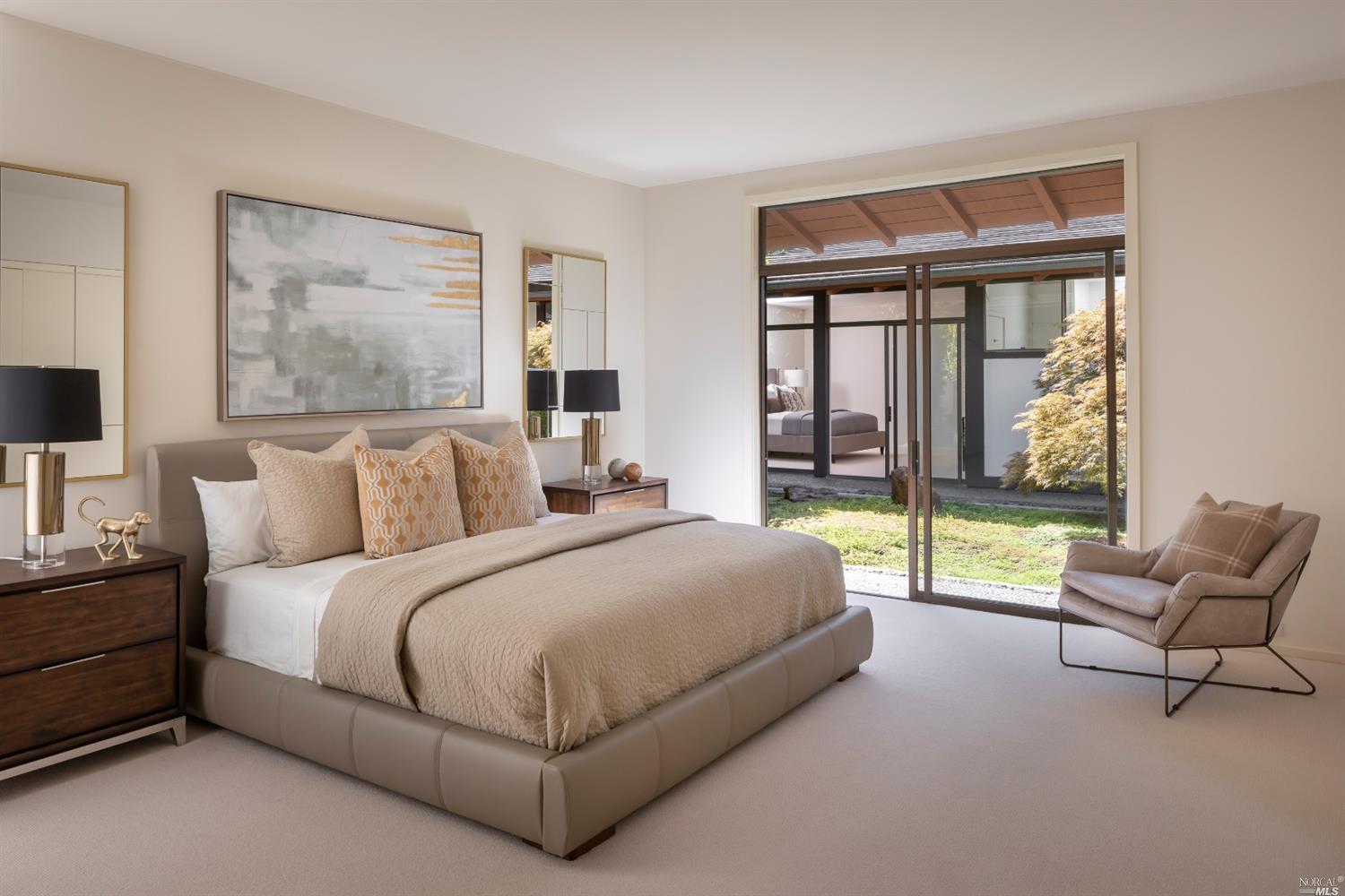 21 Canyon Road Ross, CA 94957 - Photo 28 of 41 a spacious bedroom with a bed and a couch