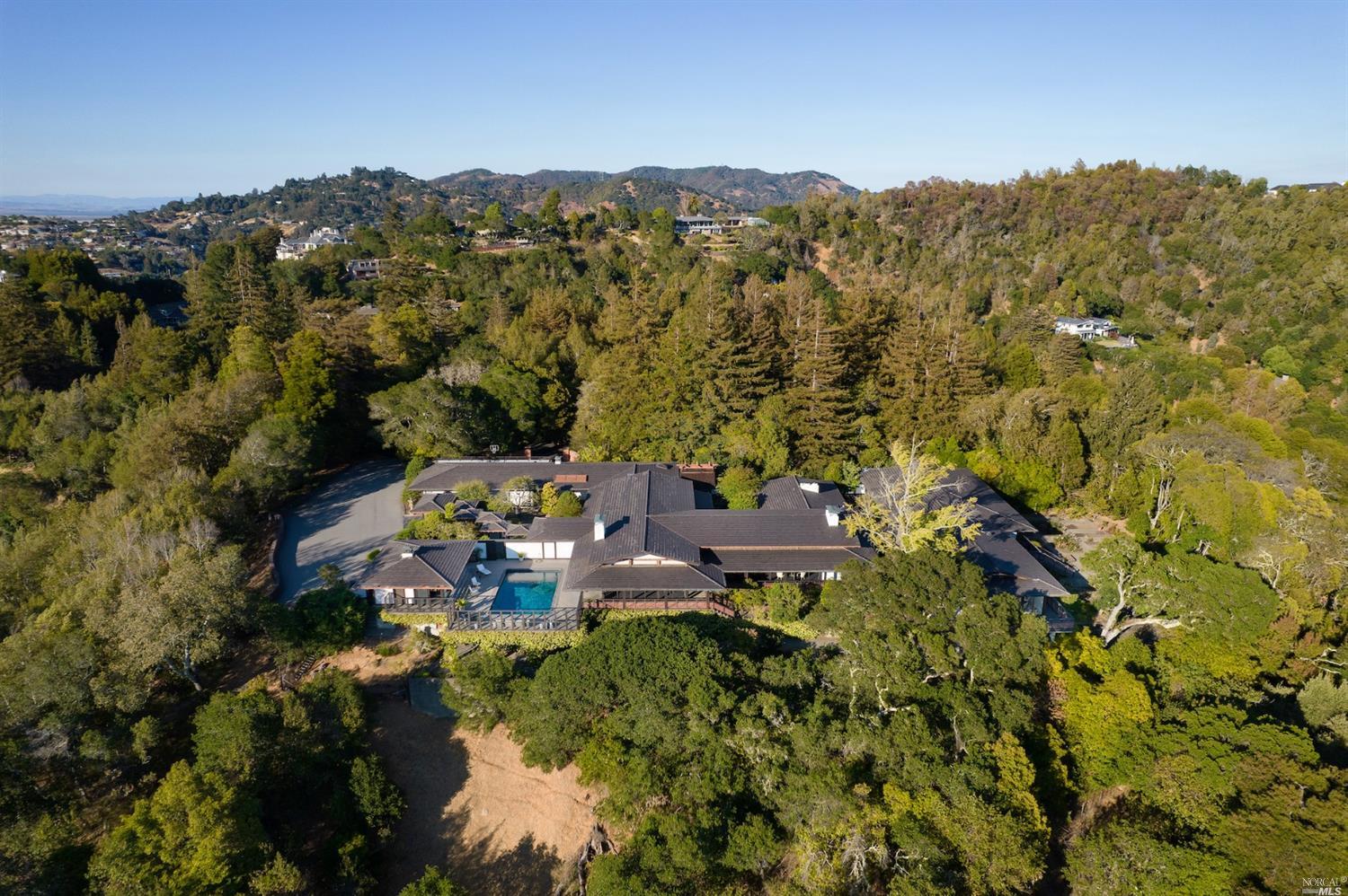 21 Canyon Road Ross, CA 94957 - Photo 3 of 41 an aerial view of a city with lots of residential buildings