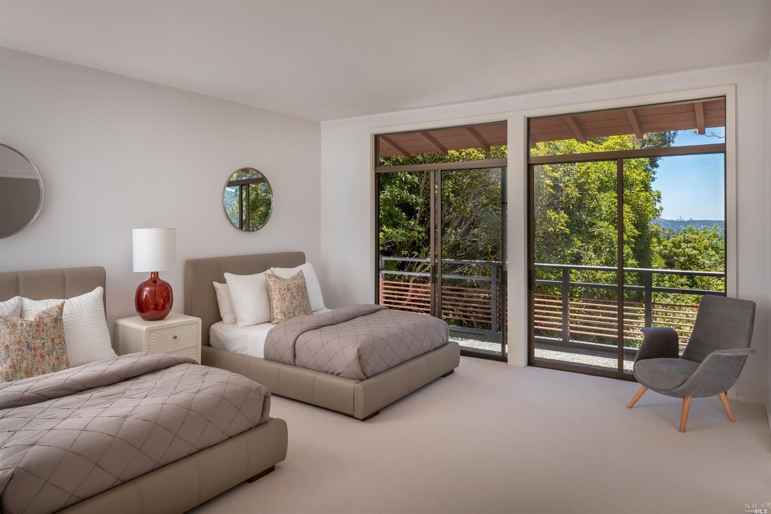 21 Canyon Road Ross, CA 94957 - Photo 31 of 41 a living room with furniture and a large window