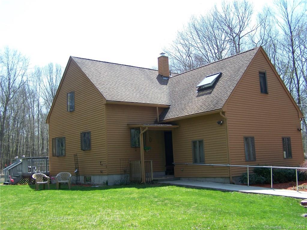 518 Westminster Road Canterbury, CT 06331 - Photo 1 of 1 a front view of a house with a yard and garage
