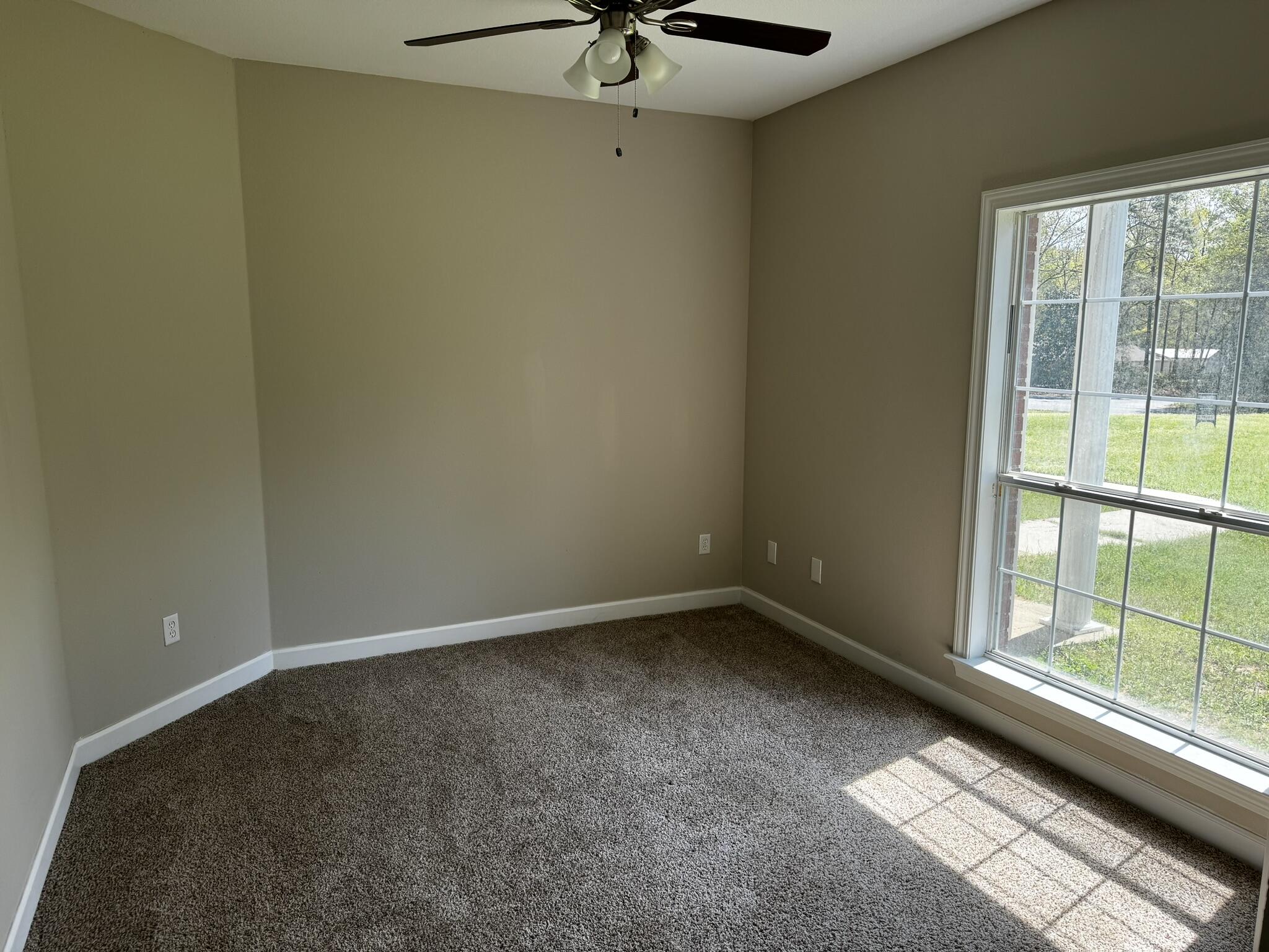 6102 Holloway Road Baker, FL 32531 - Photo 14 of 28 a view of an empty room with a window