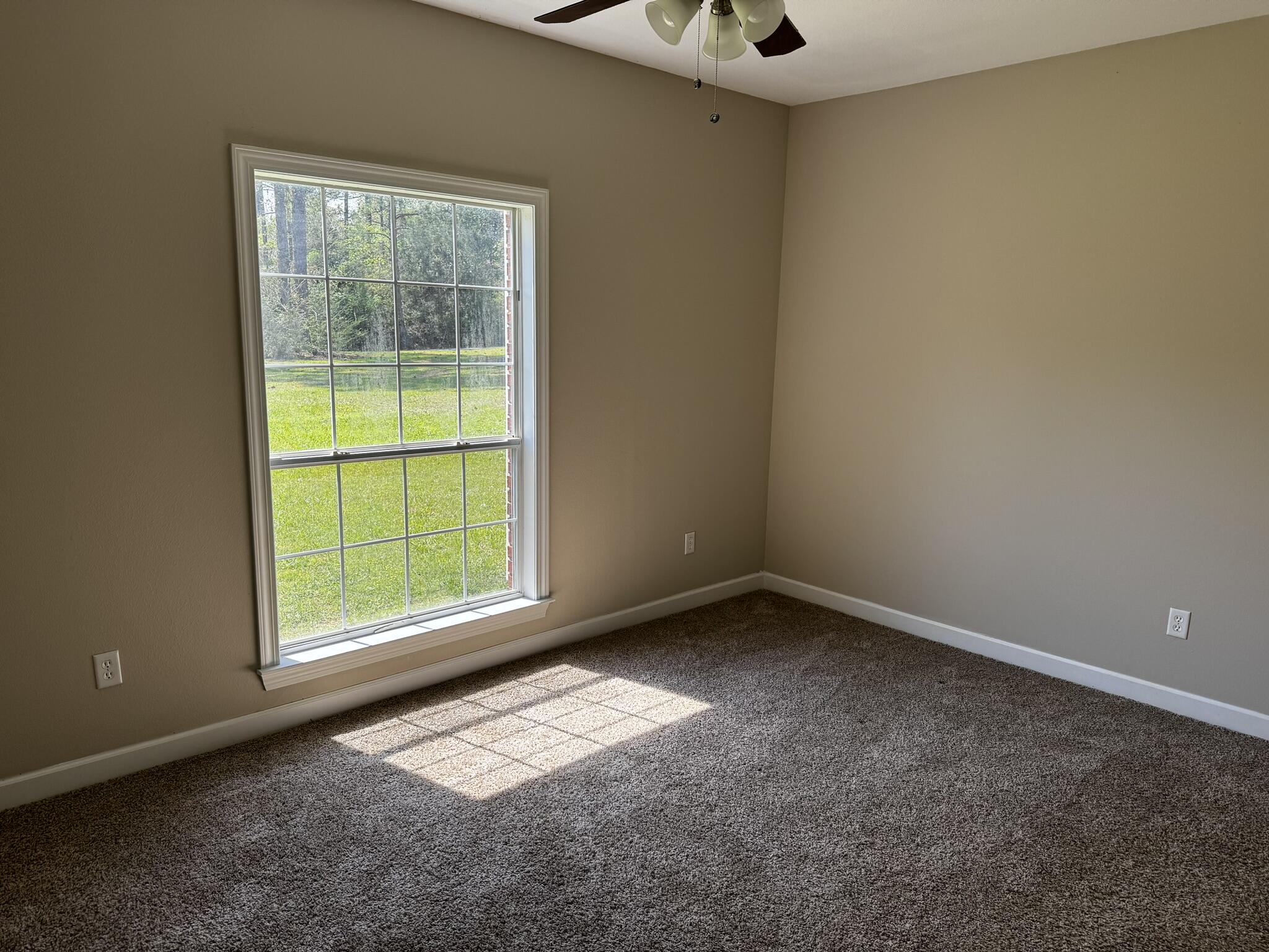 6102 Holloway Road Baker, FL 32531 - Photo 15 of 28 an empty room with a window