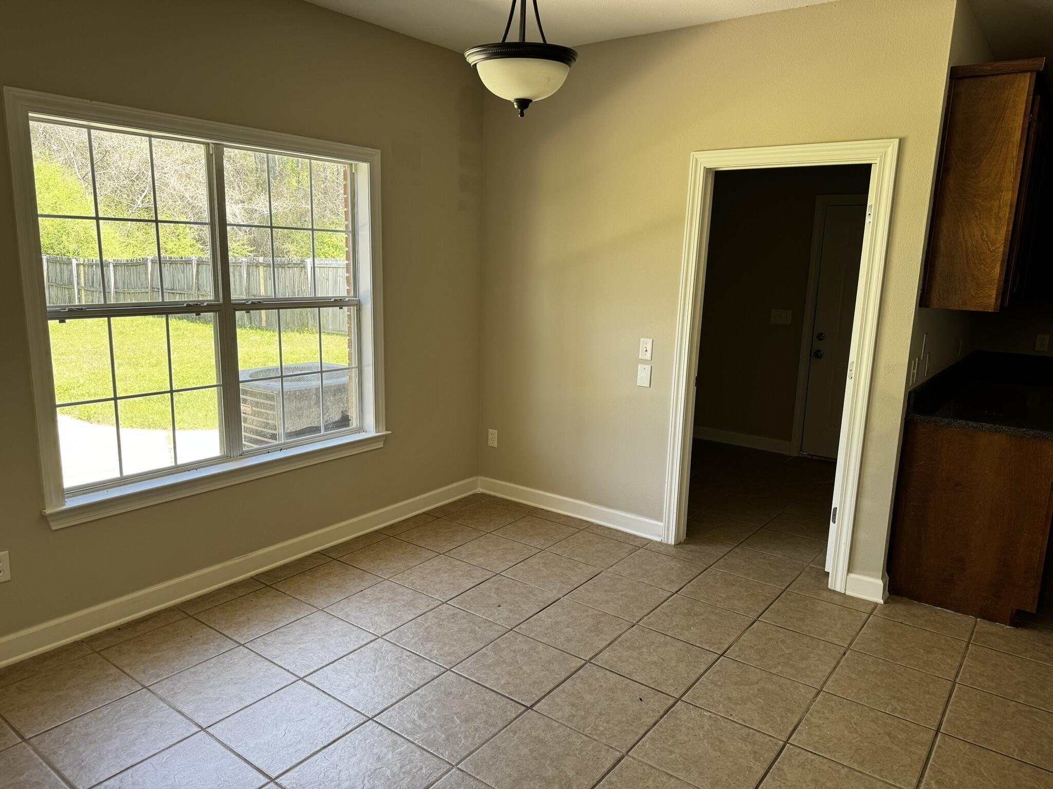 6102 Holloway Road Baker, FL 32531 - Photo 17 of 28 a view of a room with a window