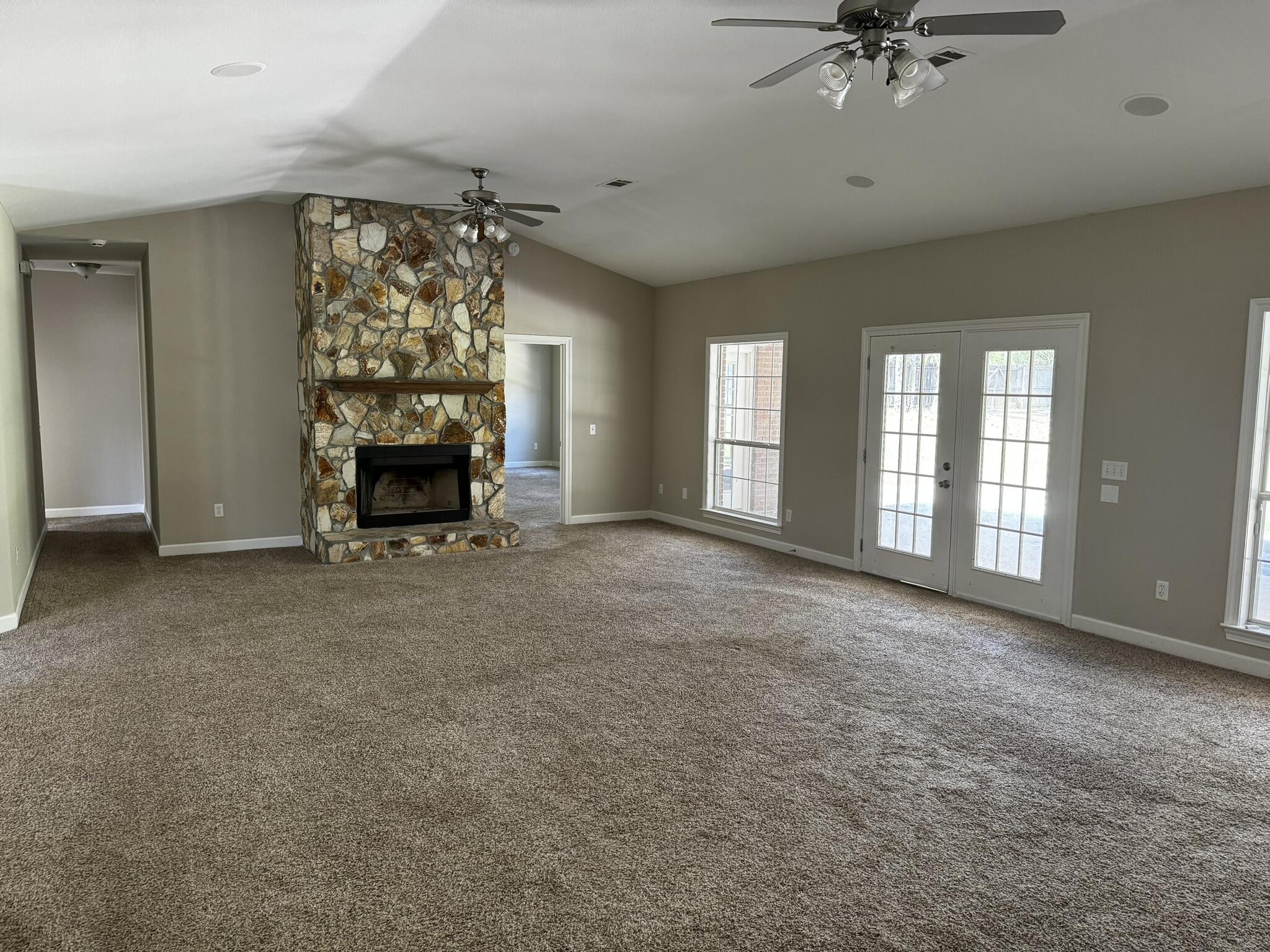 6102 Holloway Road Baker, FL 32531 - Photo 28 of 28 a view of an empty room with a fireplace and a window