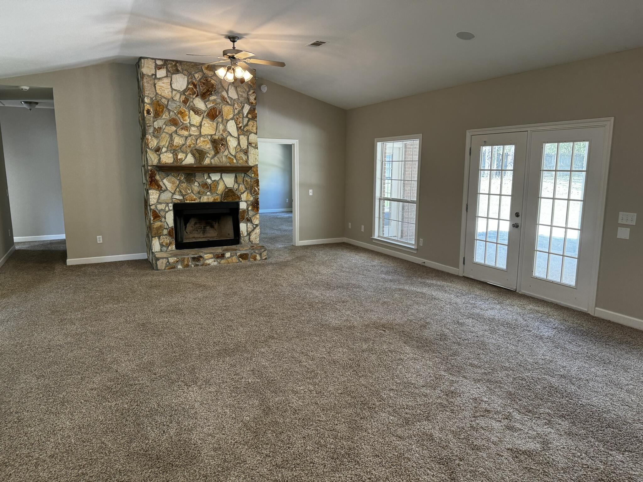 6102 Holloway Road Baker, FL 32531 - Photo 10 of 28 a view of an empty room with a fireplace