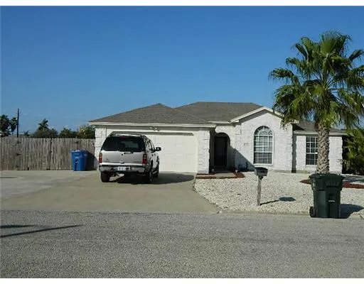 a view of a car parked in front of a house