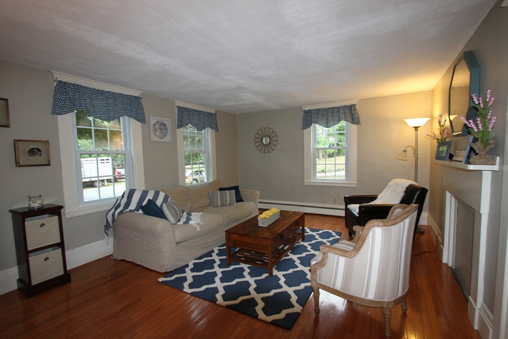 47 Locust Street Merrimac, MA 01860 - Photo 14 of 24 a living room with furniture and wooden floor
