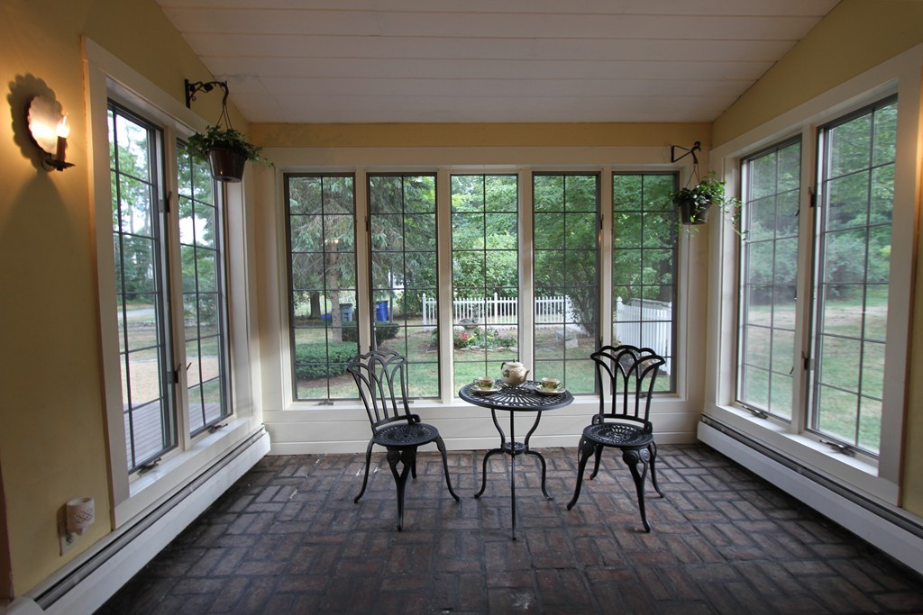 47 Locust Street Merrimac, MA 01860 - Photo 4 of 24 a living room with furniture and a large window