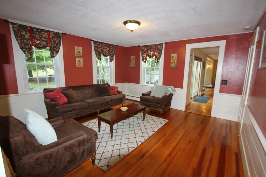 47 Locust Street Merrimac, MA 01860 - Photo 10 of 24 a living room with furniture and a large window