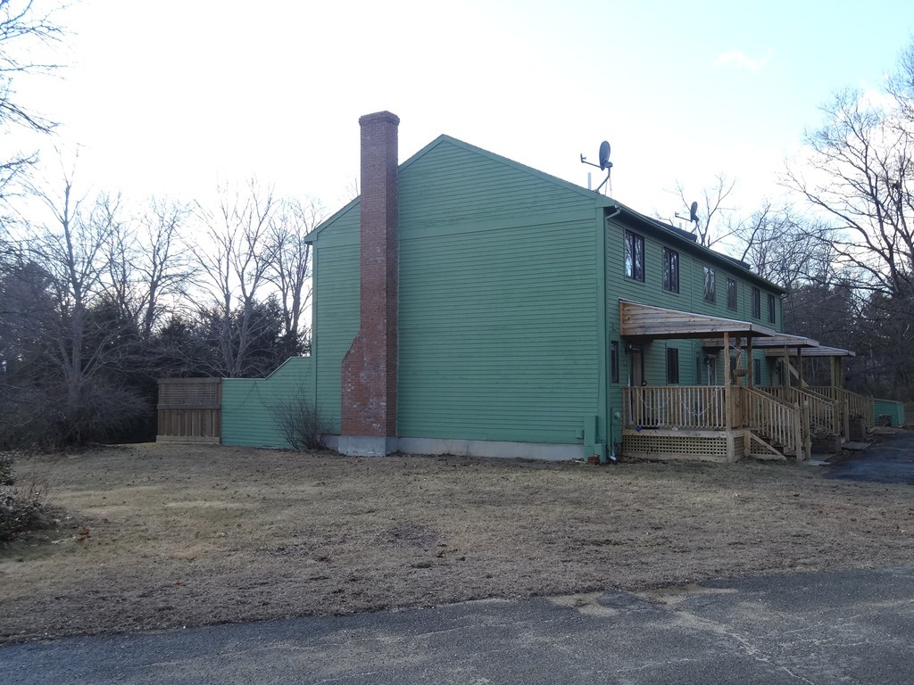 111 Brickyard Road, Unit A1 Athol, MA 01331 - Photo 1 of 15 a view of a house with a yard
