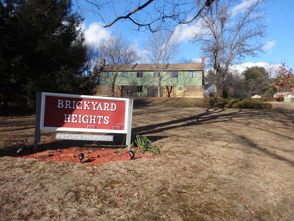 111 Brickyard Road, Unit A1 Athol, MA 01331 - Photo 12 of 15 a sign that is on the side of the road