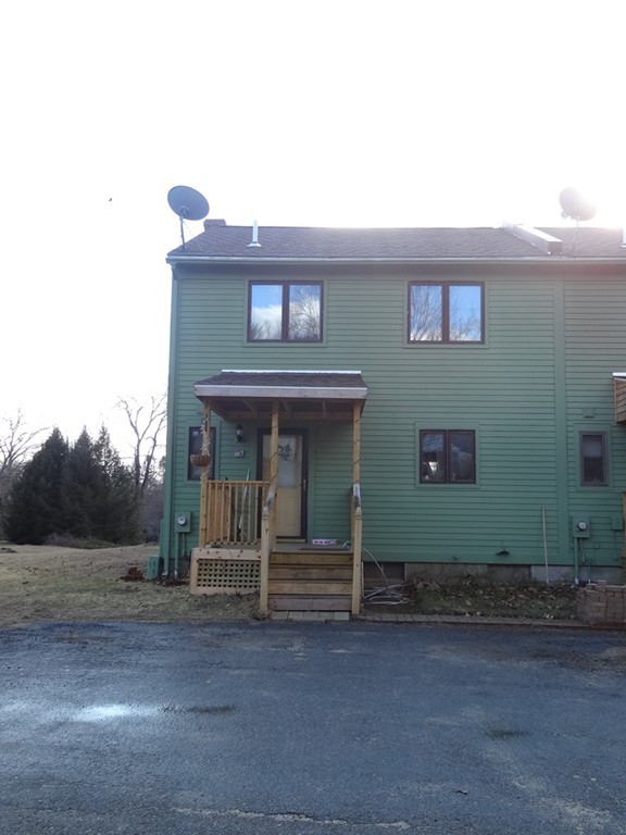 111 Brickyard Road, Unit A1 Athol, MA 01331 - Photo 2 of 15 a front view of a house with garden
