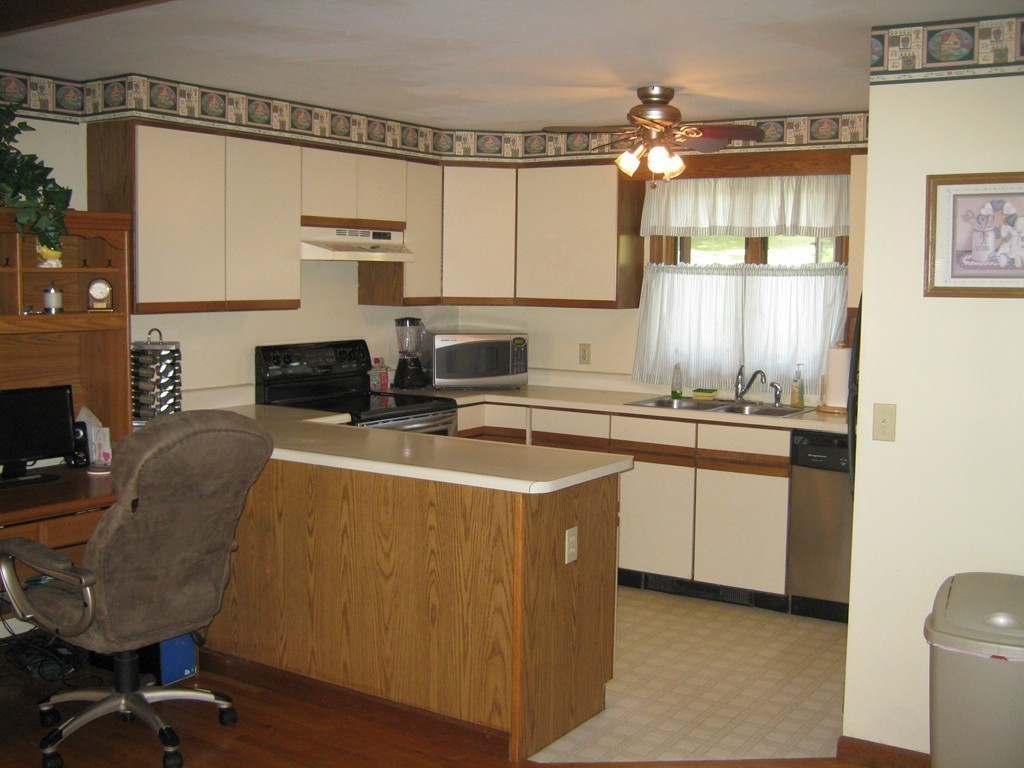 111 Brickyard Road, Unit A1 Athol, MA 01331 - Photo 3 of 15 a kitchen with a sink cabinets and window