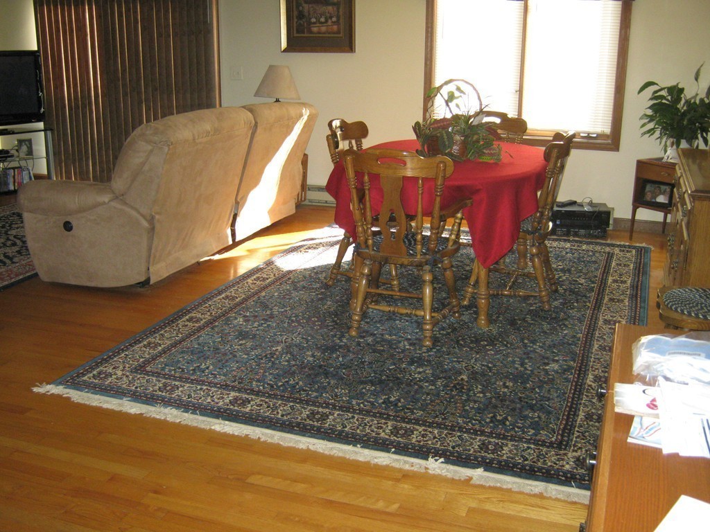 111 Brickyard Road, Unit A1 Athol, MA 01331 - Photo 4 of 15 a view of a dining room with furniture and wooden floor