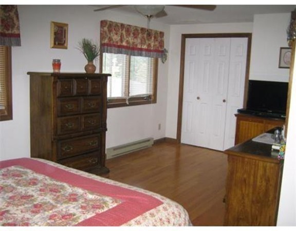 111 Brickyard Road, Unit A1 Athol, MA 01331 - Photo 8 of 15 a bedroom with a bed and furniture