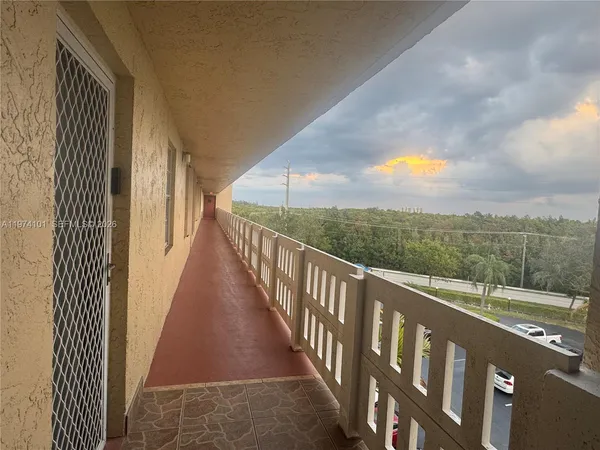 a view of a balcony with city view