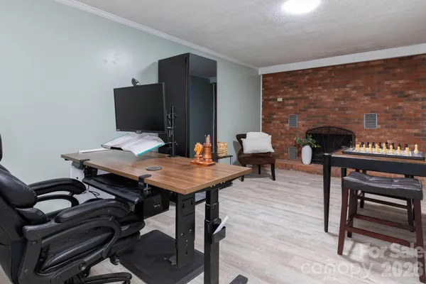 a view of a livingroom with furniture