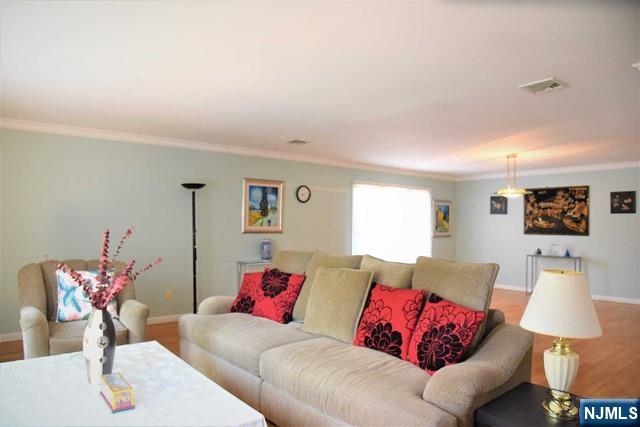 39 Irving Avenue Englewood Cliffs, NJ 07632 - Photo 11 of 31 a living room with furniture