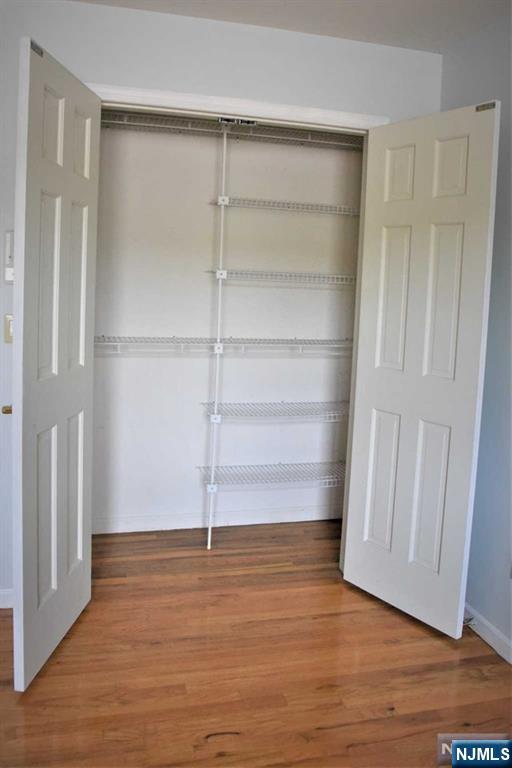 39 Irving Avenue Englewood Cliffs, NJ 07632 - Photo 20 of 31 a view of an empty room with wooden floor