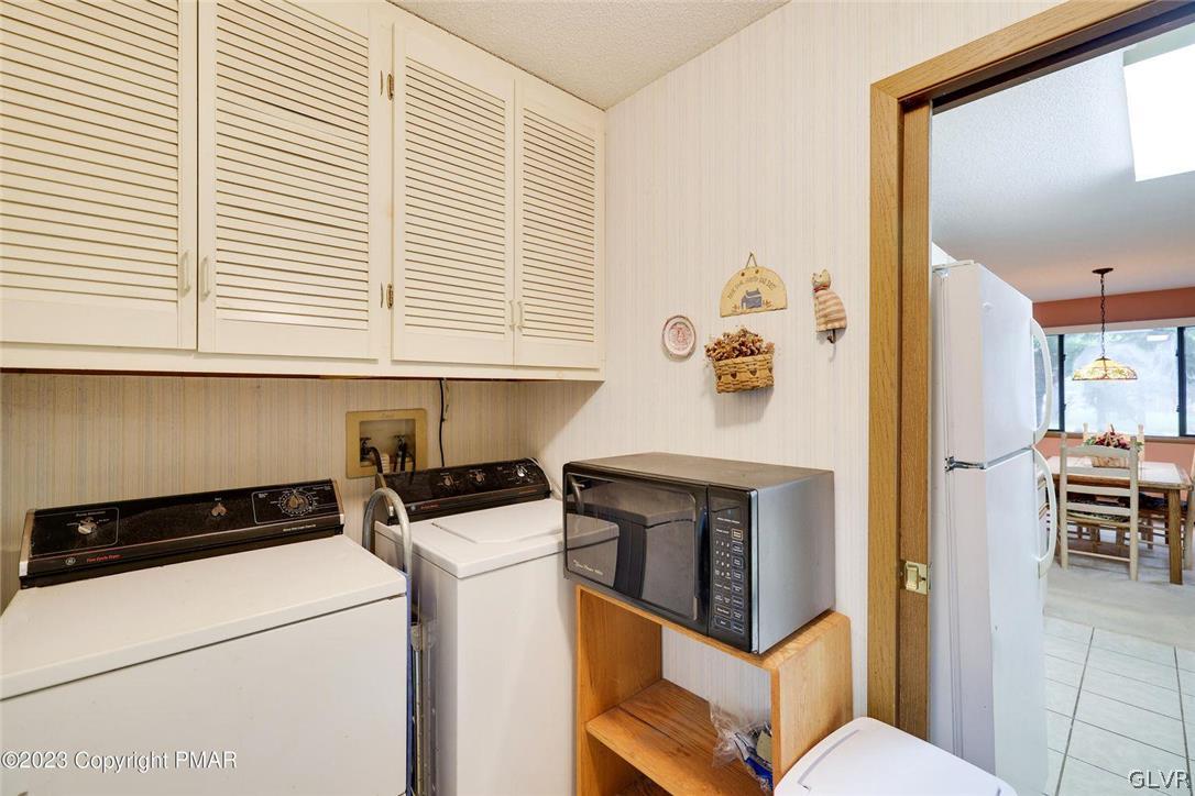 2150 Titania Road Tobyhanna, PA 18466 - Photo 14 of 31 a kitchen with a stove and a white refrigerator
