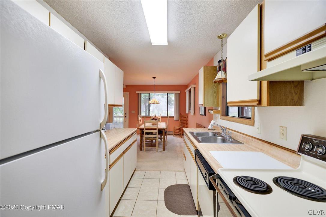2150 Titania Road Tobyhanna, PA 18466 - Photo 15 of 31 a room with furniture a flat screen tv and a window