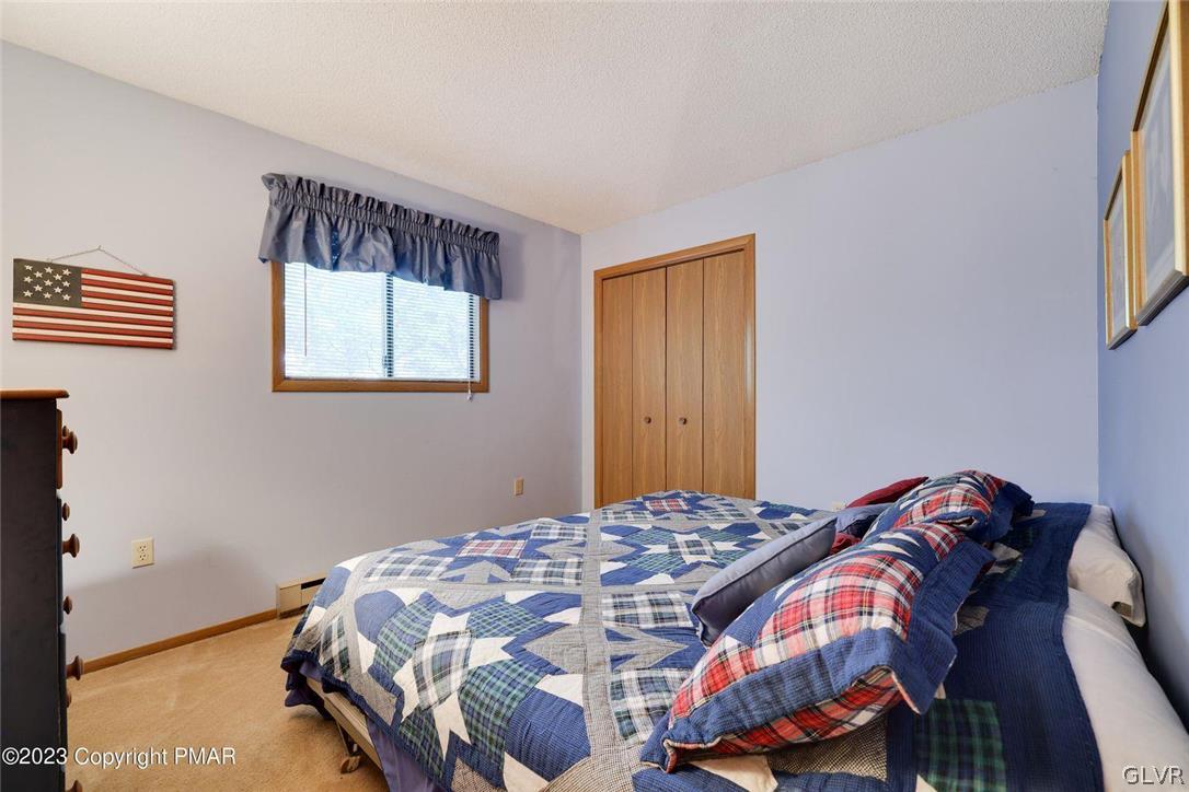 2150 Titania Road Tobyhanna, PA 18466 - Photo 22 of 31 a bedroom with a bed and a window