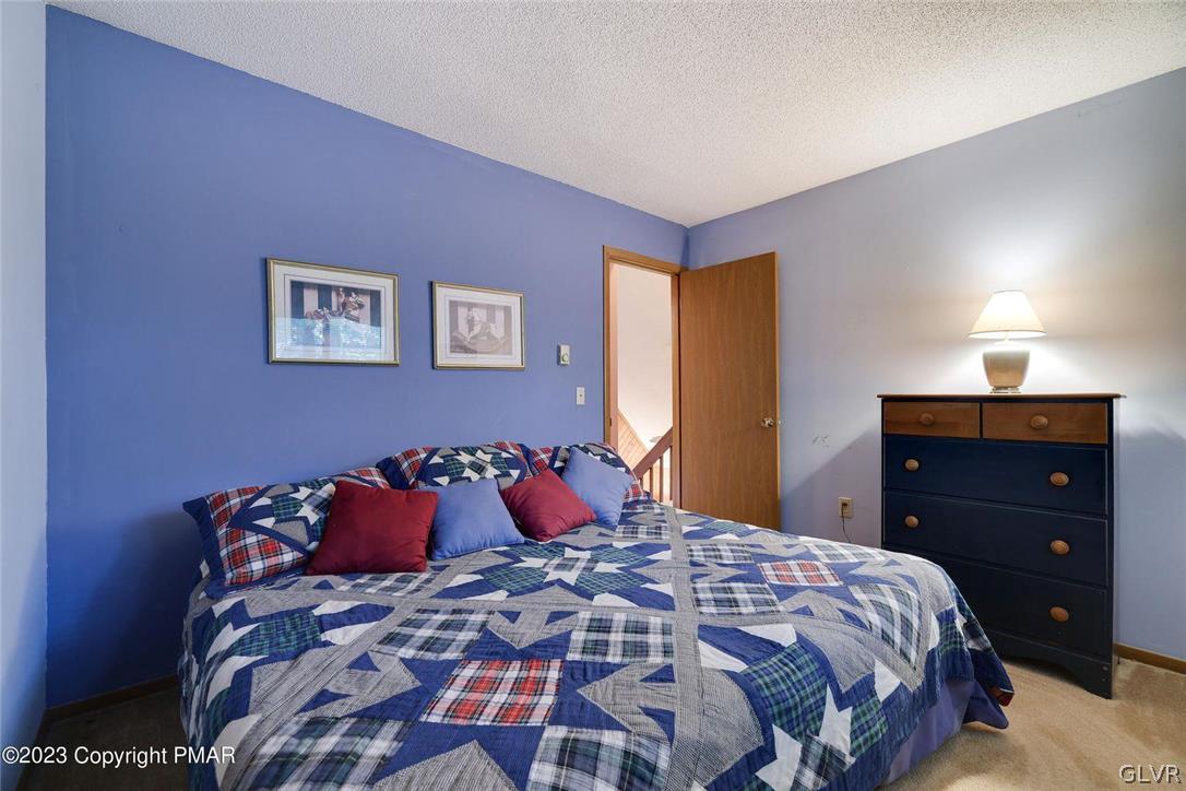 2150 Titania Road Tobyhanna, PA 18466 - Photo 23 of 31 a bedroom with a bed and a dresser