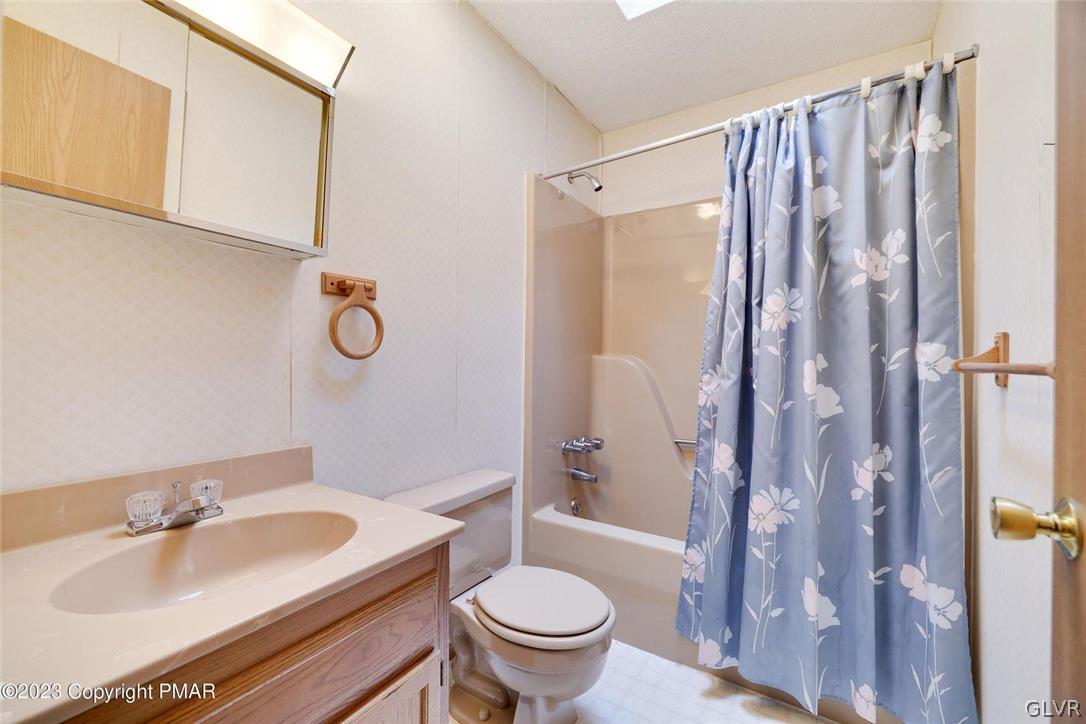 2150 Titania Road Tobyhanna, PA 18466 - Photo 24 of 31 a bathroom with a sink toilet and shower