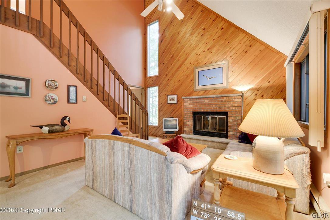 2150 Titania Road Tobyhanna, PA 18466 - Photo 6 of 31 a living room with furniture and a fireplace