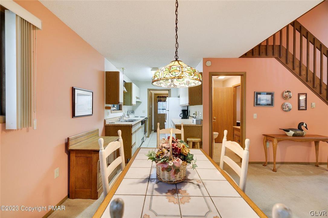 2150 Titania Road Tobyhanna, PA 18466 - Photo 9 of 31 a view of a dining room with furniture and chandelier