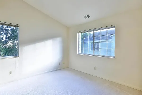 a bathroom with a shower and a toilet