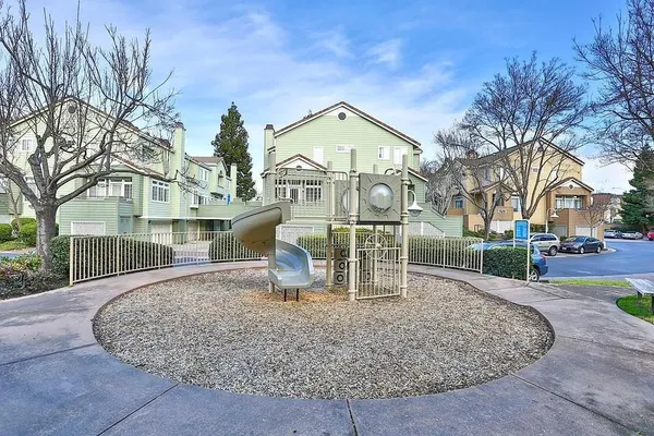 a view of a house with a street