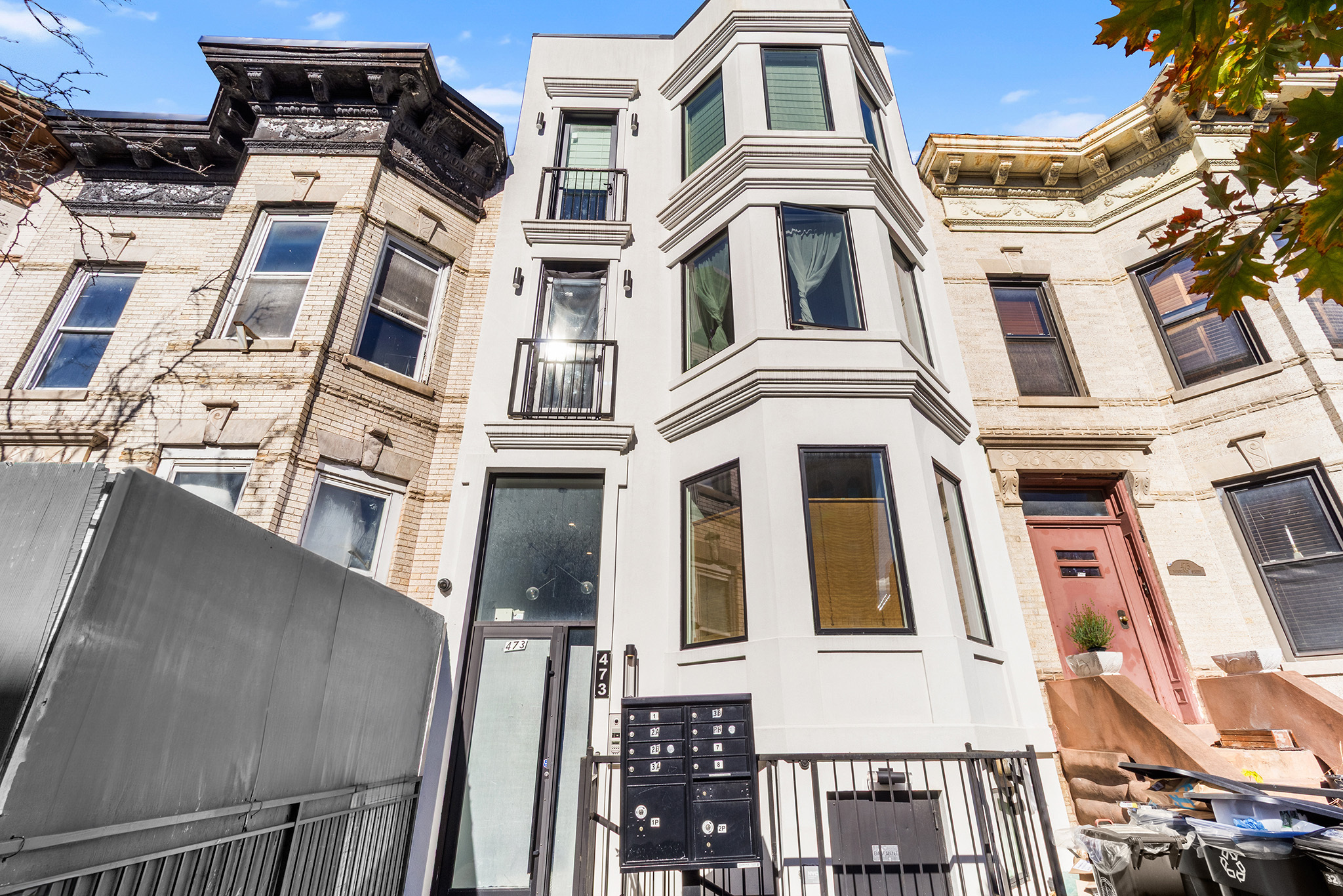 473 Bainbridge Street, Unit 2B Brooklyn, NY 11233 - Photo 1 of 15 a front view of a multi story residential apartment building