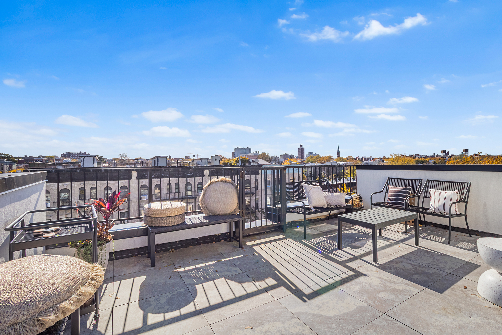 473 Bainbridge Street, Unit 2B Brooklyn, NY 11233 - Photo 12 of 15 a view of a terrace with chairs