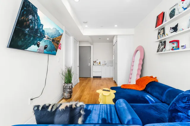 a bed room with a bed and a couch