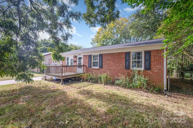 a house with trees in front of it