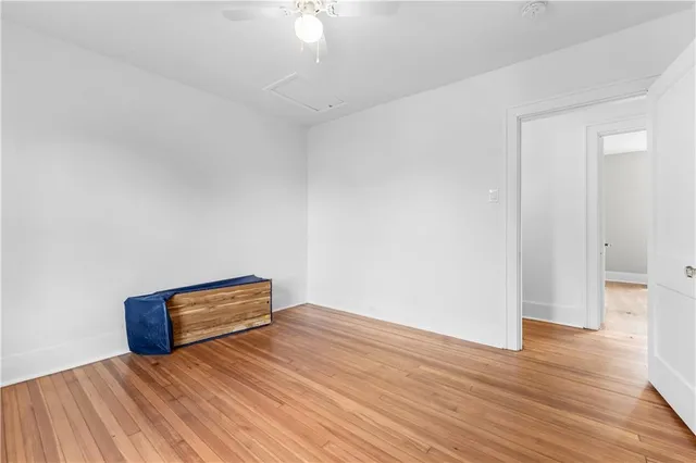 a view of room with wooden floor