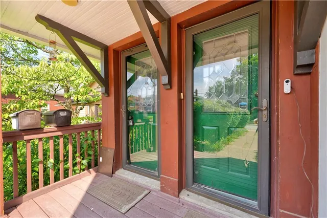 a view of a porch and a yard
