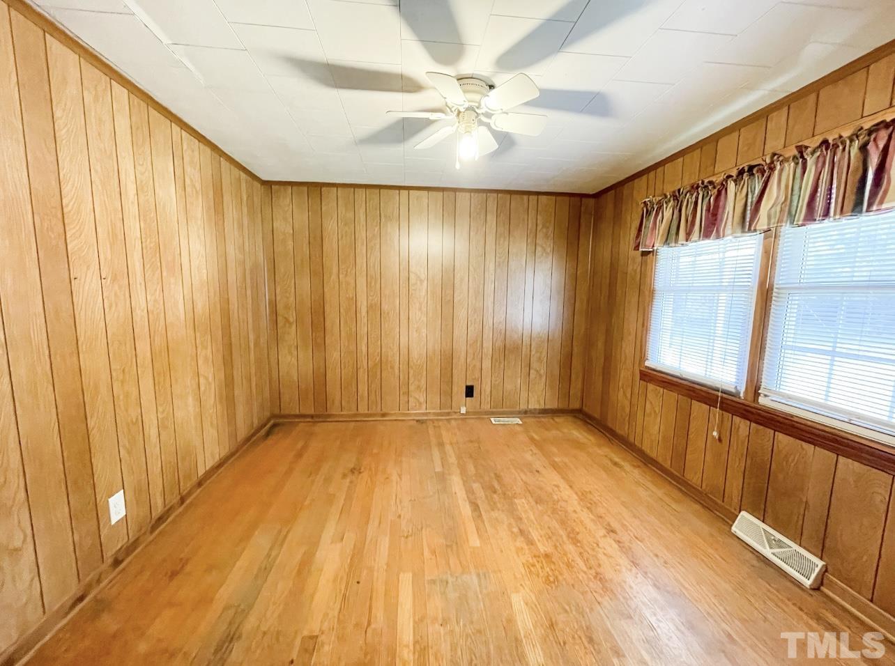 8718 Oxford Road Timberlake, NC 27583 - Photo 16 of 27 a view of an empty room with a window