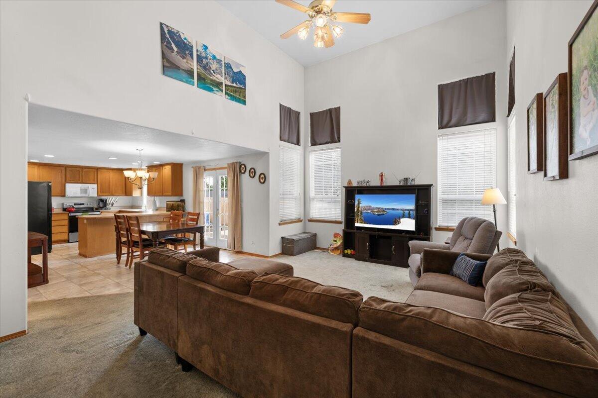 752 Mallory Court Central Point, OR 97502 - Photo 7 of 32 a living room with furniture and a flat screen tv