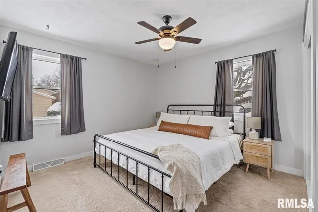 a bathroom with a sink toilet and vanity