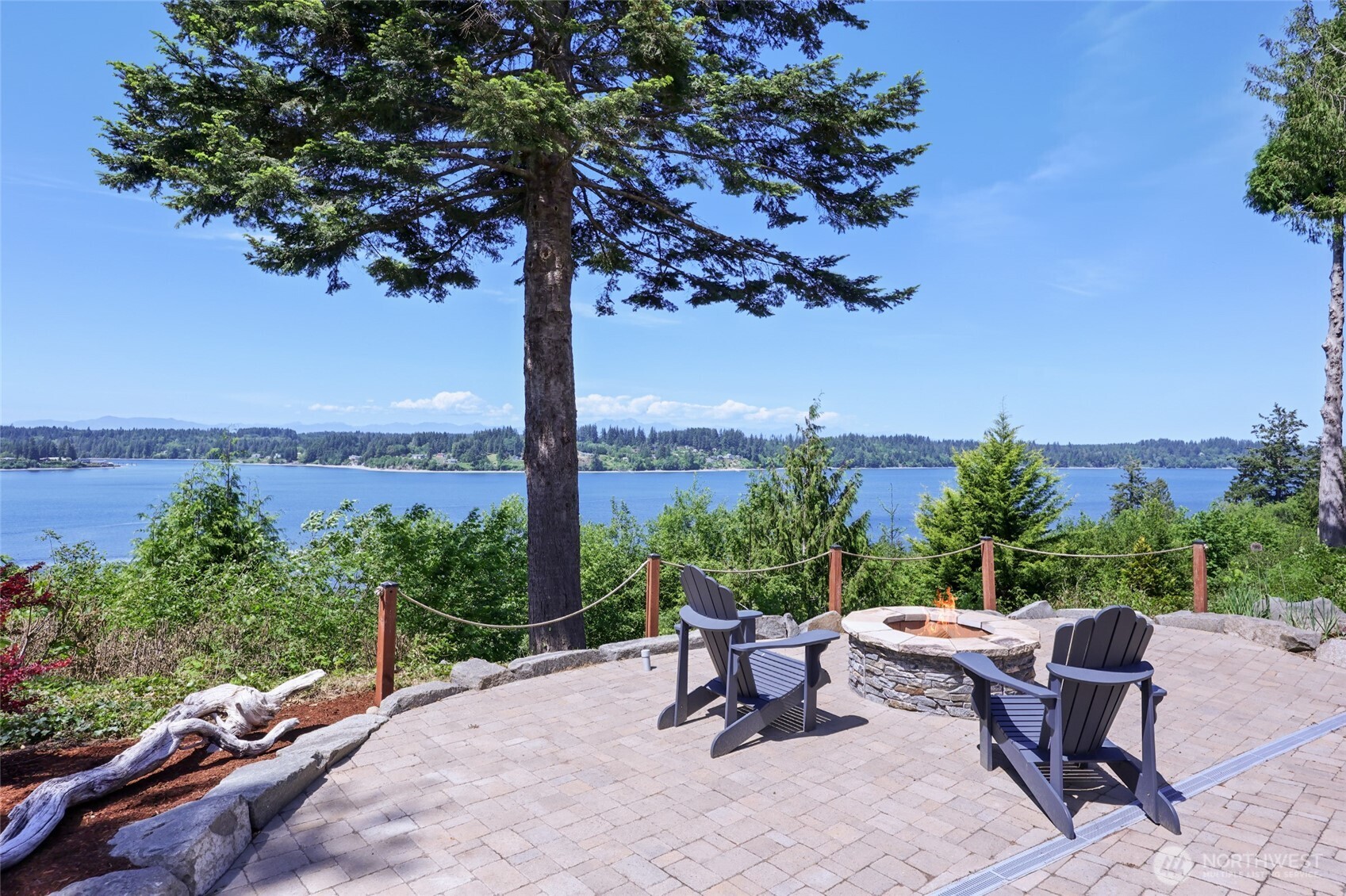 7713 78th Loop Northwest Olympia, WA 98502 - Photo 16 of 40 a view of a sitting area with furniture and garden