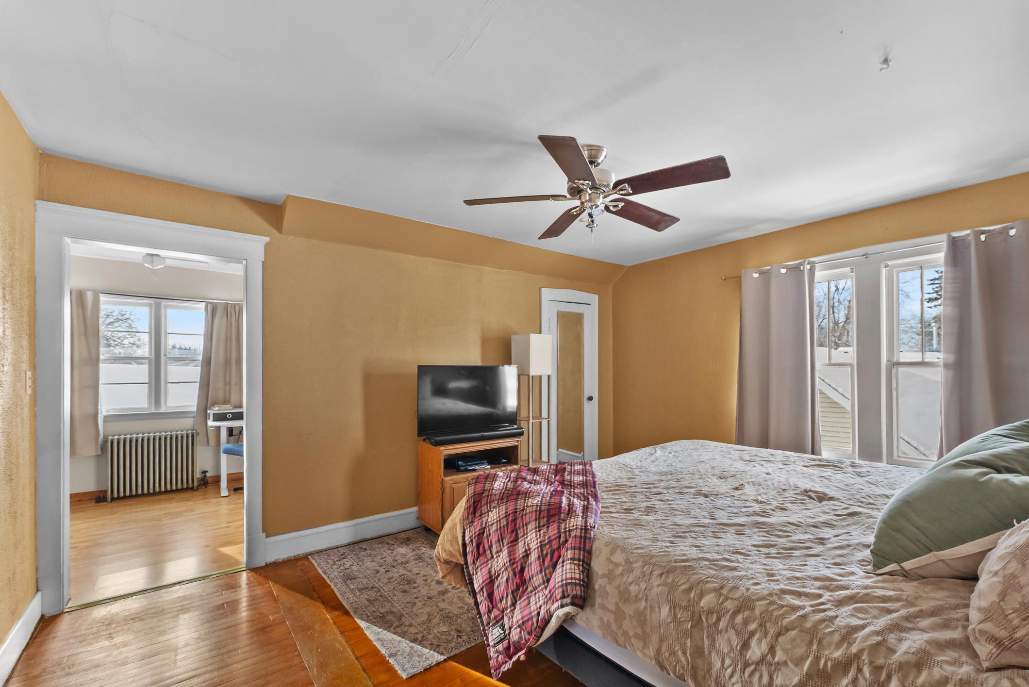 1617 Madison Street Manitowoc, WI 54220 - Photo 18 of 34 Wood floors. Fan. Closet.